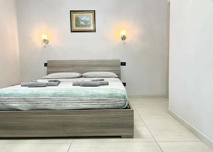 Pokoj s manželskou postelí velikosti queen